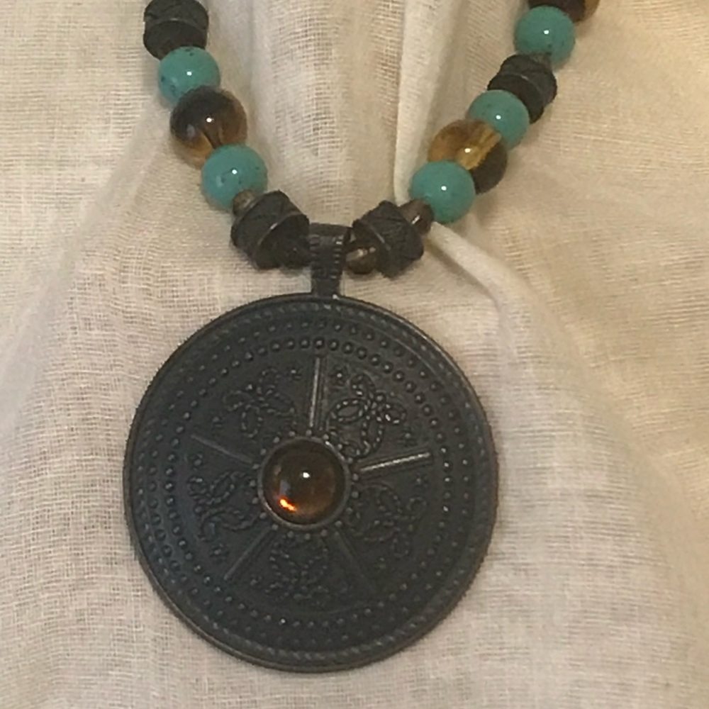 Turquoise brown/amber colored beads. Definite statement!